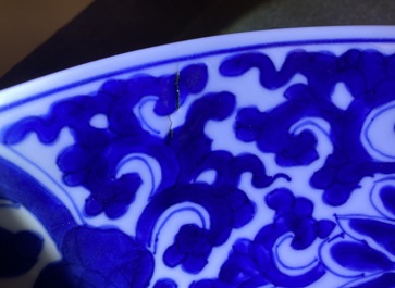 A Chinese blue and white 'lotus scroll' charger, Kangxi